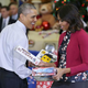 President Barack Obama and first lady Michelle Obama sort toys and gifts donated by Executive Office of the President staff to the Marine Corps Reserve Toys for Tots Program at Joint Base Anacostia-Bolling on Dec. 10, 2014, in Washington, D.C.
Chip Somodevilla/Getty Images